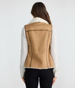 Dylan Vest, Tan