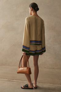 Lucia Top, Amara